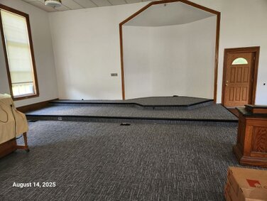 The new carpet is nearly finished.  They added some trim around the edges up front.