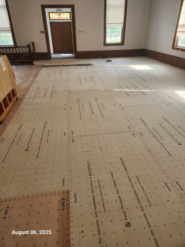 We had a new subfloor put in to help with the carpet installation.