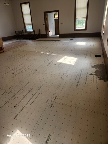 We had a new subfloor put in to help with the carpet installation.