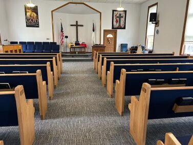 This is the sanctuary after most of the work had been completed.  The next step was getting the new curtains up.
