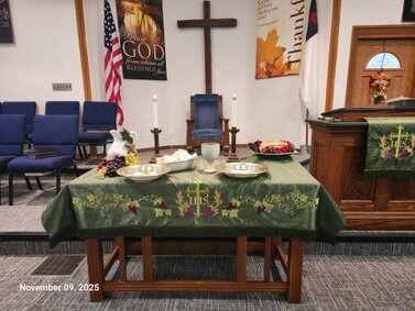 This photo of the front table was taken on Veterans Day Sunday 2025